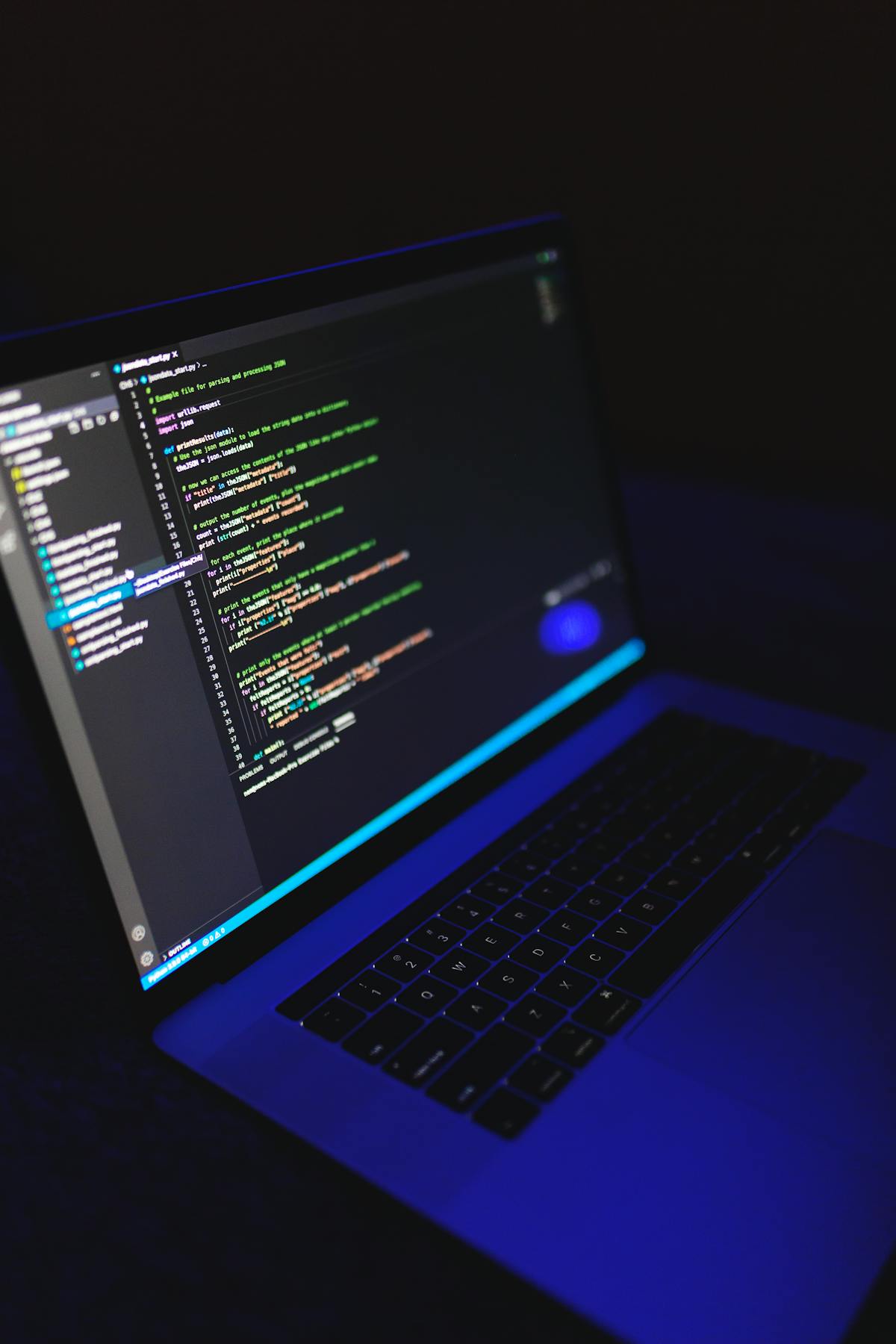 Developer workspace with code on screen, representing a self-hosted GitHub Actions macOS Runner on a remote Mac